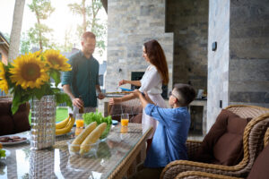Photo of a family enjoying their outdoor space designed by a Florida luxury outdoor builder