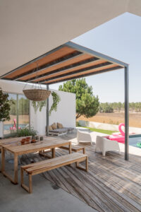 Modern house with garden swimming pool and wooden 